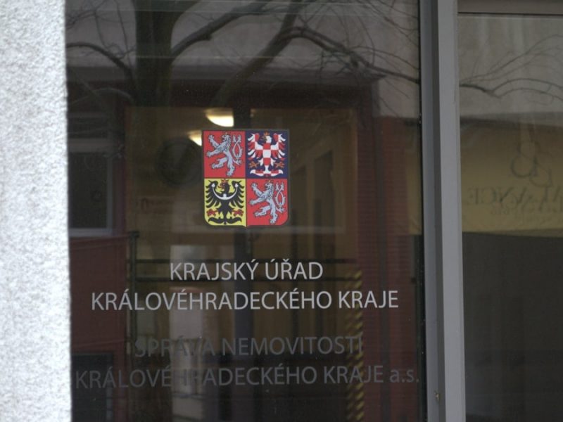 Sign on glass door for regional office.